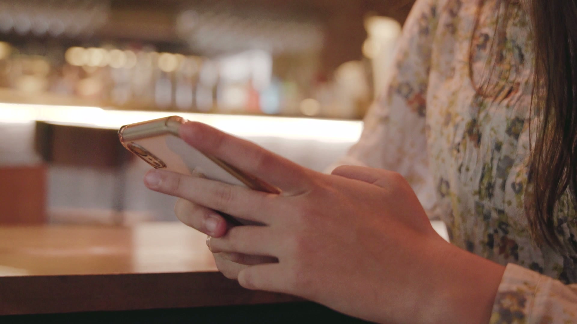 A parent checking their phone, ready to decide on an UpBox reminder