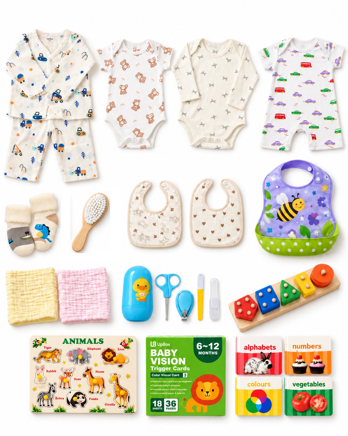 Everything inside the Standard UpBox for 6–9 months, laid out on white